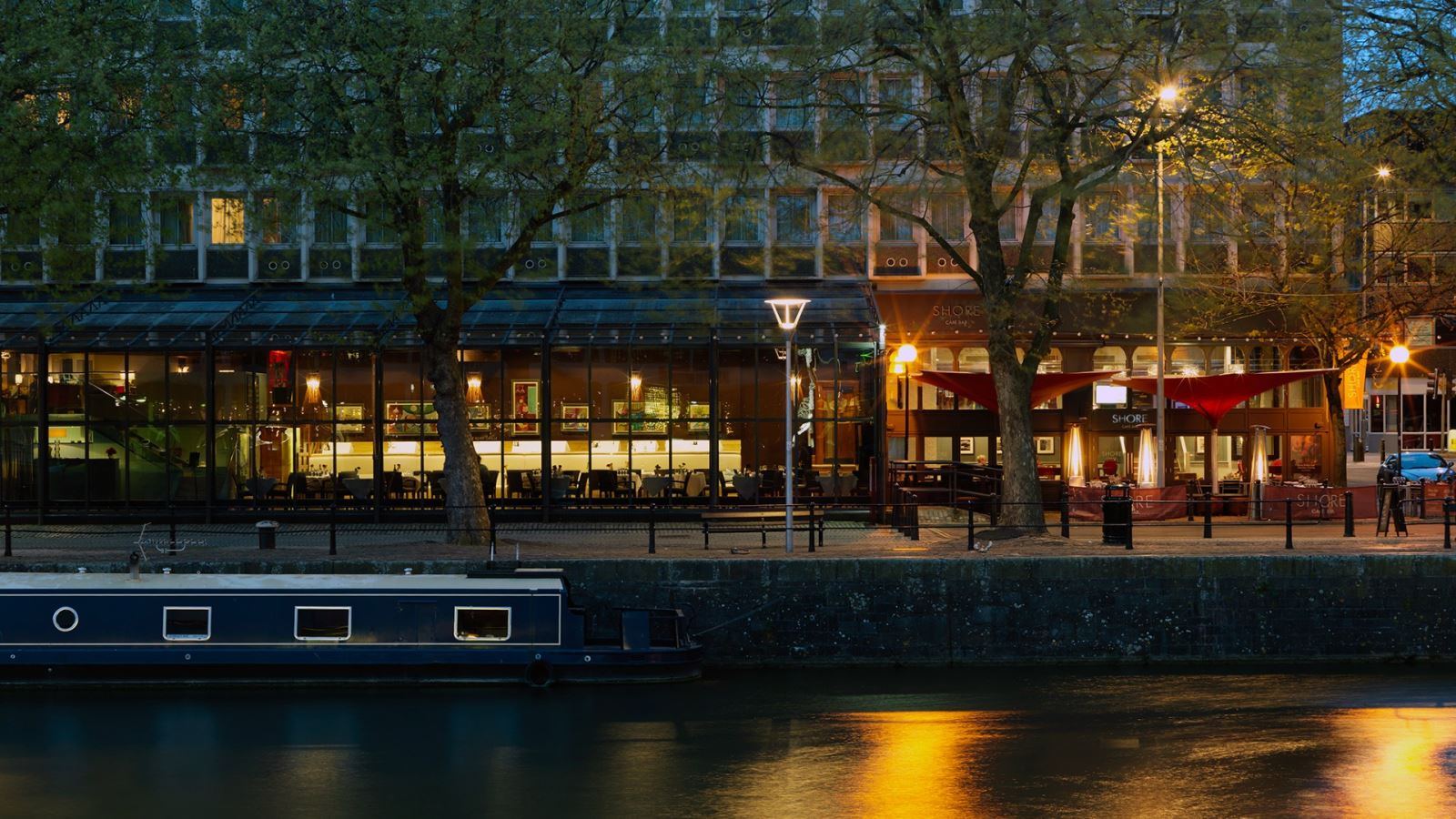 The Bristol Hotel waterfront exterior in the evening
